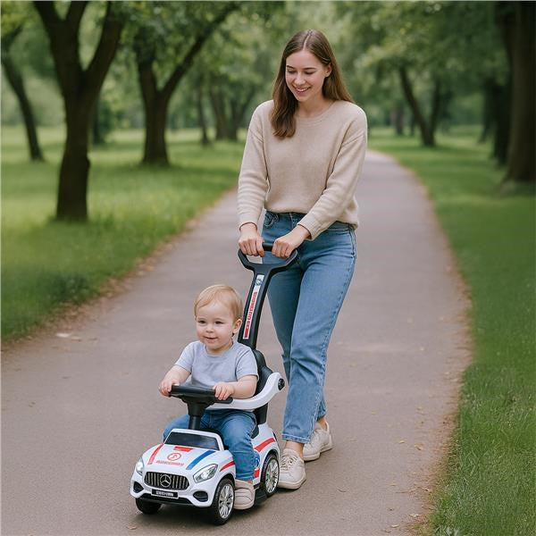 Zenélő bébitaxi vezetőrúddal Baby Mix MENTŐAUTÓ fehér