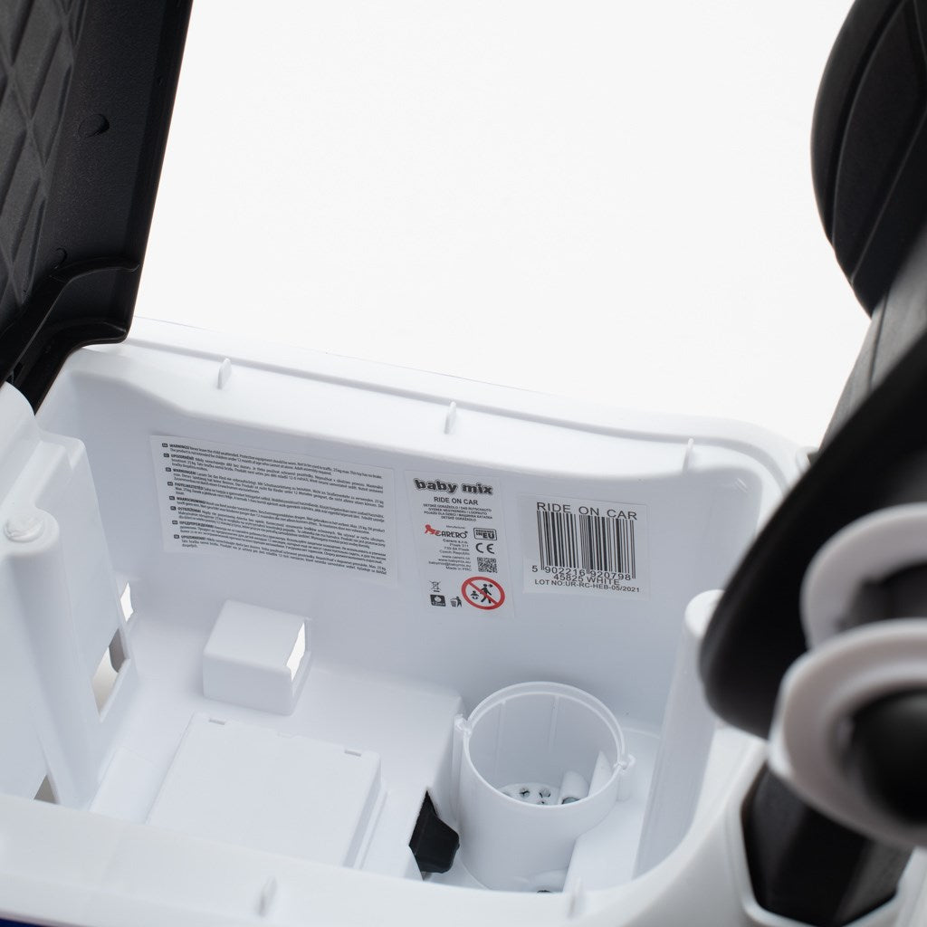 Zenélő bébitaxi vezetőrúddal Baby Mix MENTŐAUTÓ fehér
