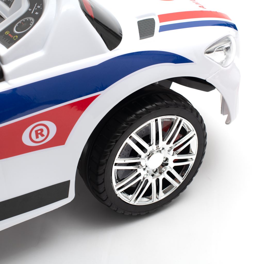 Zenélő bébitaxi vezetőrúddal Baby Mix MENTŐAUTÓ fehér