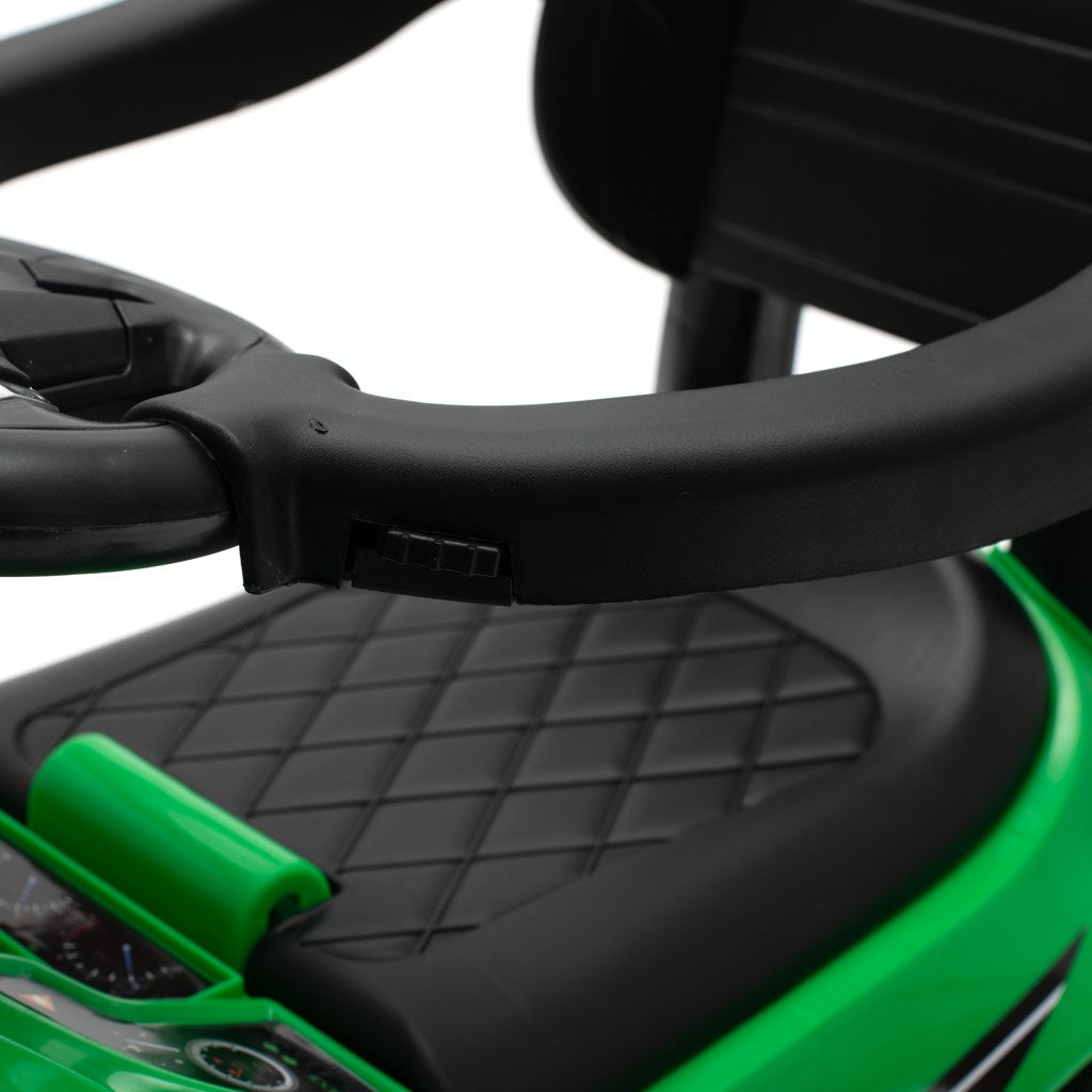 Zenélő bébitaxi vezetőrúddal Baby Mix RACER zöld