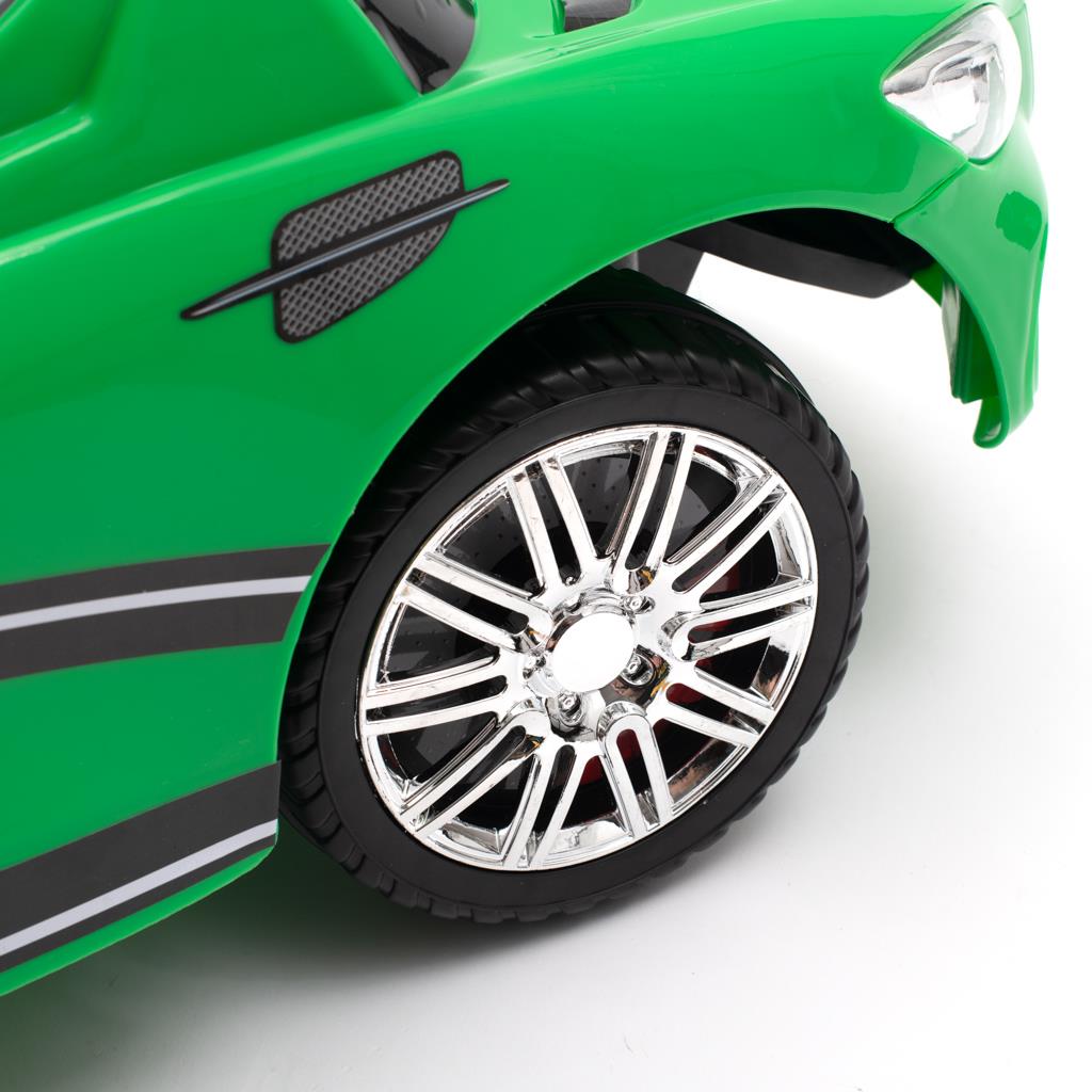 Zenélő bébitaxi vezetőrúddal Baby Mix RACER zöld