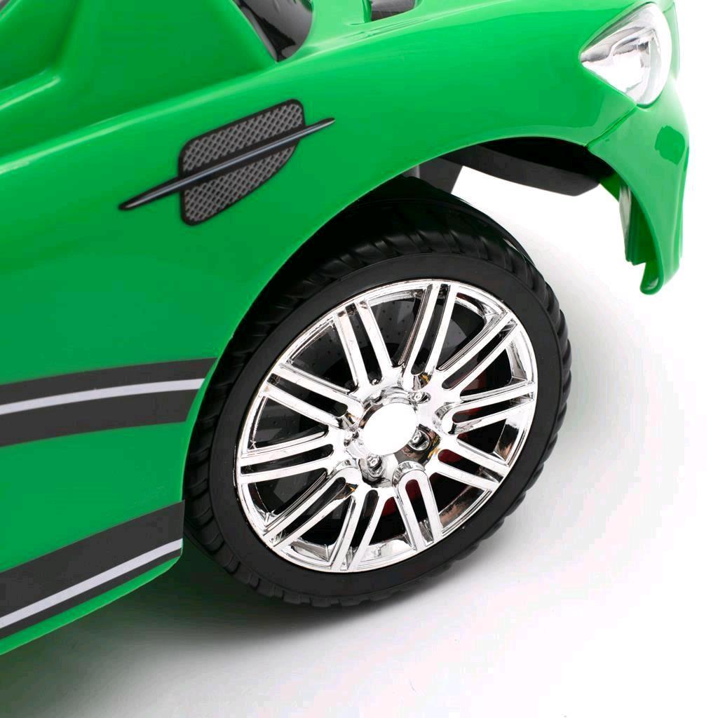 Zenélő bébitaxi vezetőrúddal Baby Mix RACER piros