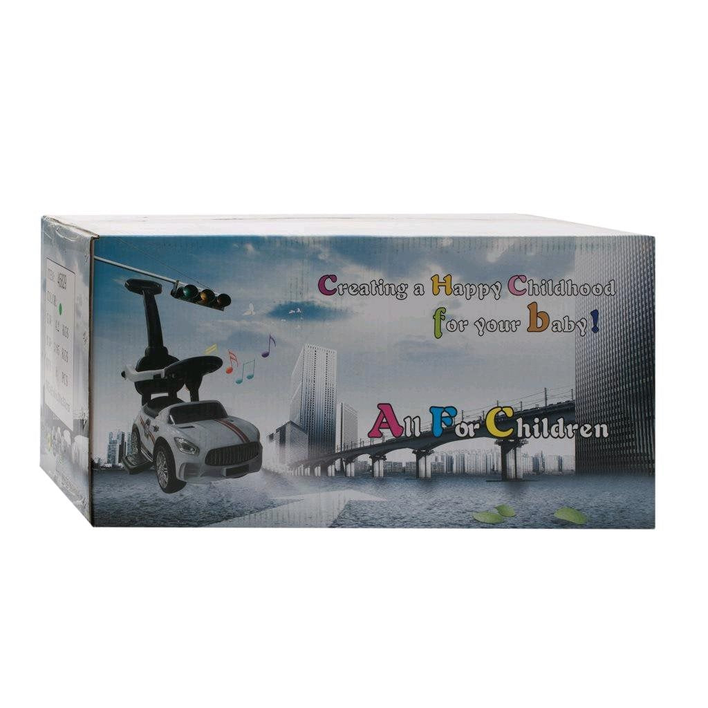 Zenélő bébitaxi vezetőrúddal Baby Mix RACER piros